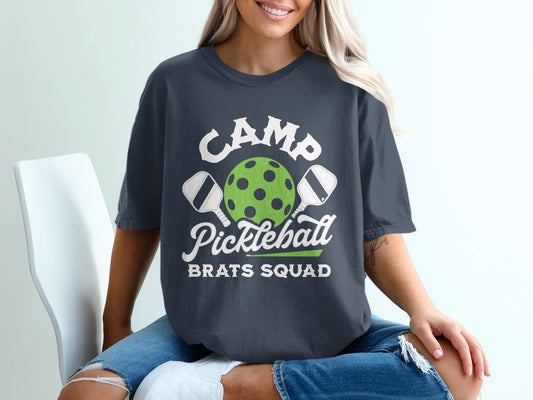Dark t-shirt with "Camp Pickleball Brats Squad" and pickleball graphic.