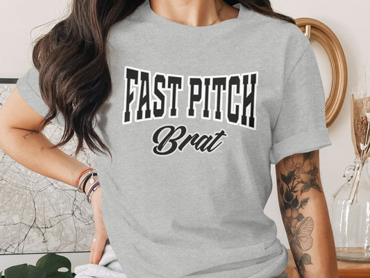 Grey t-shirt with "FAST PITCH Brat" text graphic on the front.