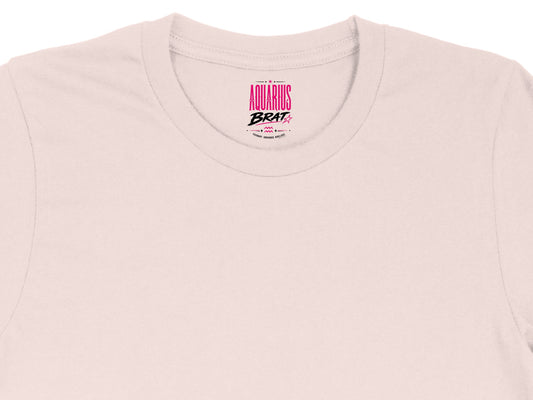 Pink t-shirt with "Aquarius Brat" graphic and "visionary, unbounded, rebellious" text.