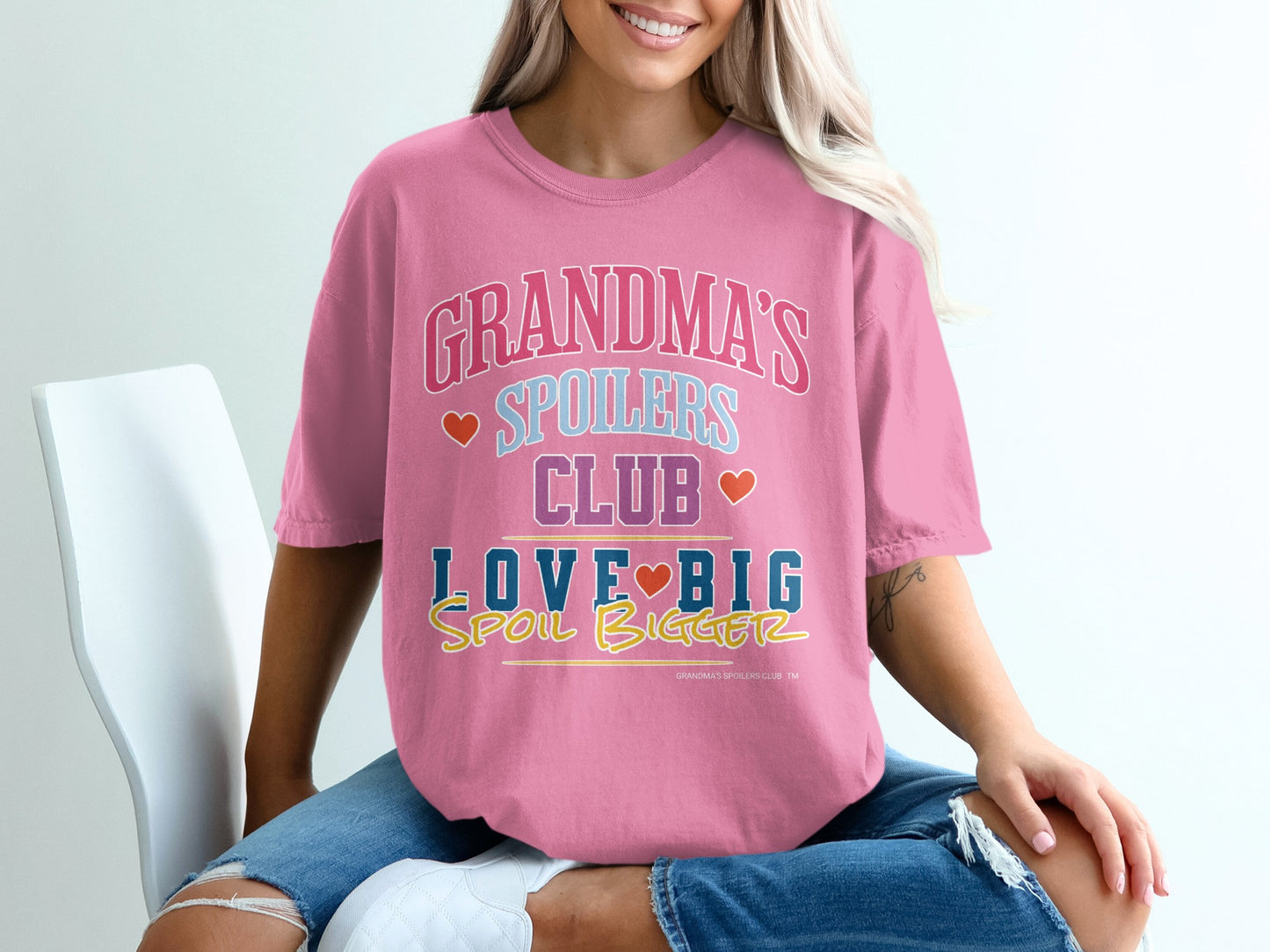 Pink t-shirt with "Grandma's Spoilers Club Love Big Spoil Bigger" text.