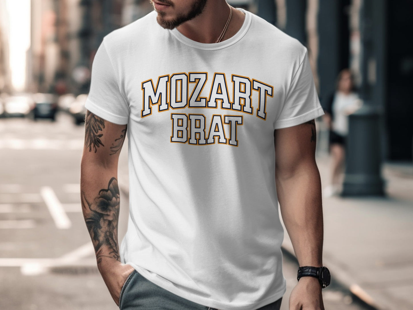 White t-shirt with "MOZART BRAT" text in collegiate style lettering.