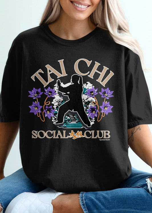 Black t-shirt with "Tai Chi Social Club" text and lotus flowers.