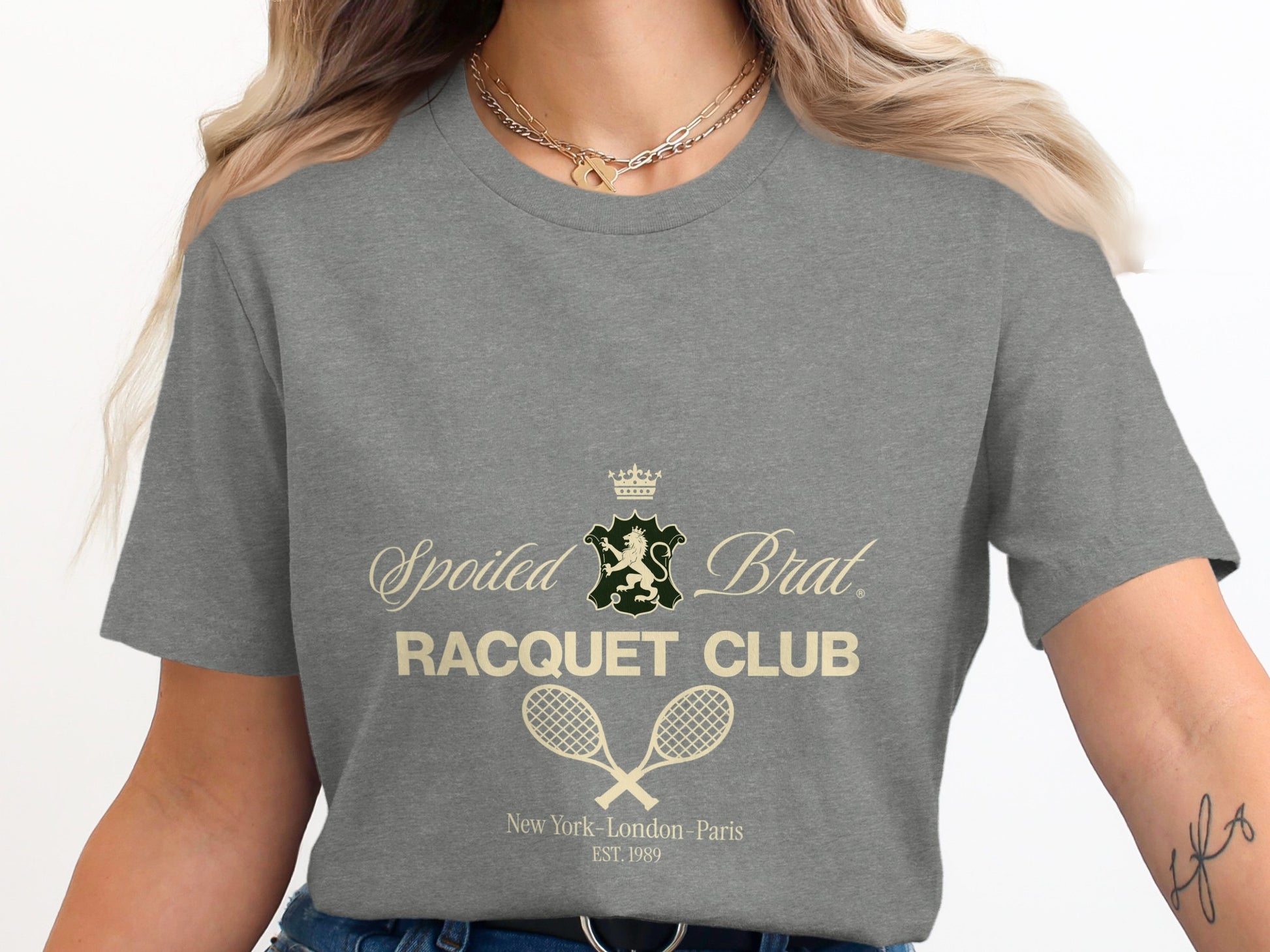 Gray t-shirt with "Spoiled Brat Racquet Club" and crossed tennis racquets.