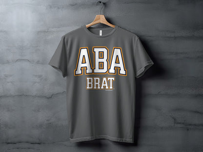Dark gray t-shirt with "ABA BRAT" printed in white and orange.