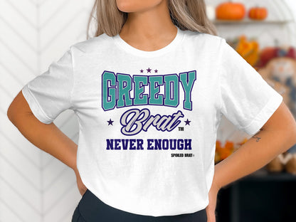 White t-shirt with "GREEDY Brat NEVER ENOUGH" text and Spoiled Brat logo.