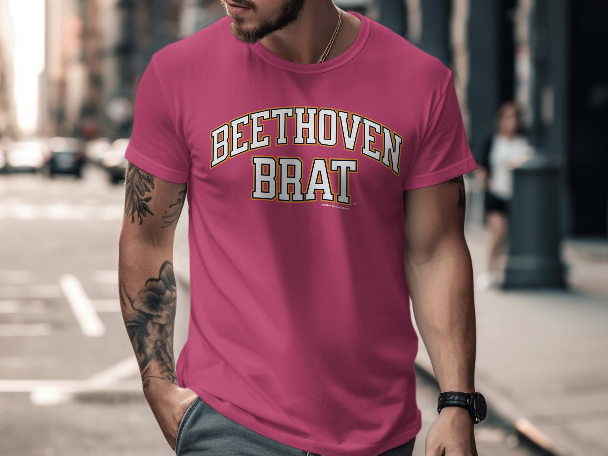 Pink t-shirt with "BEETHOVEN BRAT" text in varsity lettering
