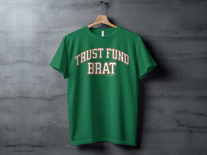 Green t-shirt with "TRUST FUND BRAT" text in arched white and gold letters.