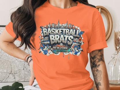 Orange t-shirt with "Basketball Brats New York Edition" graffiti style graphic.