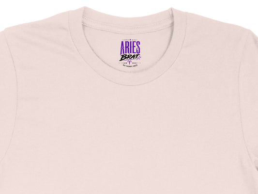 Pale pink t-shirt with "Aries Brat" and Zodiac symbol design.