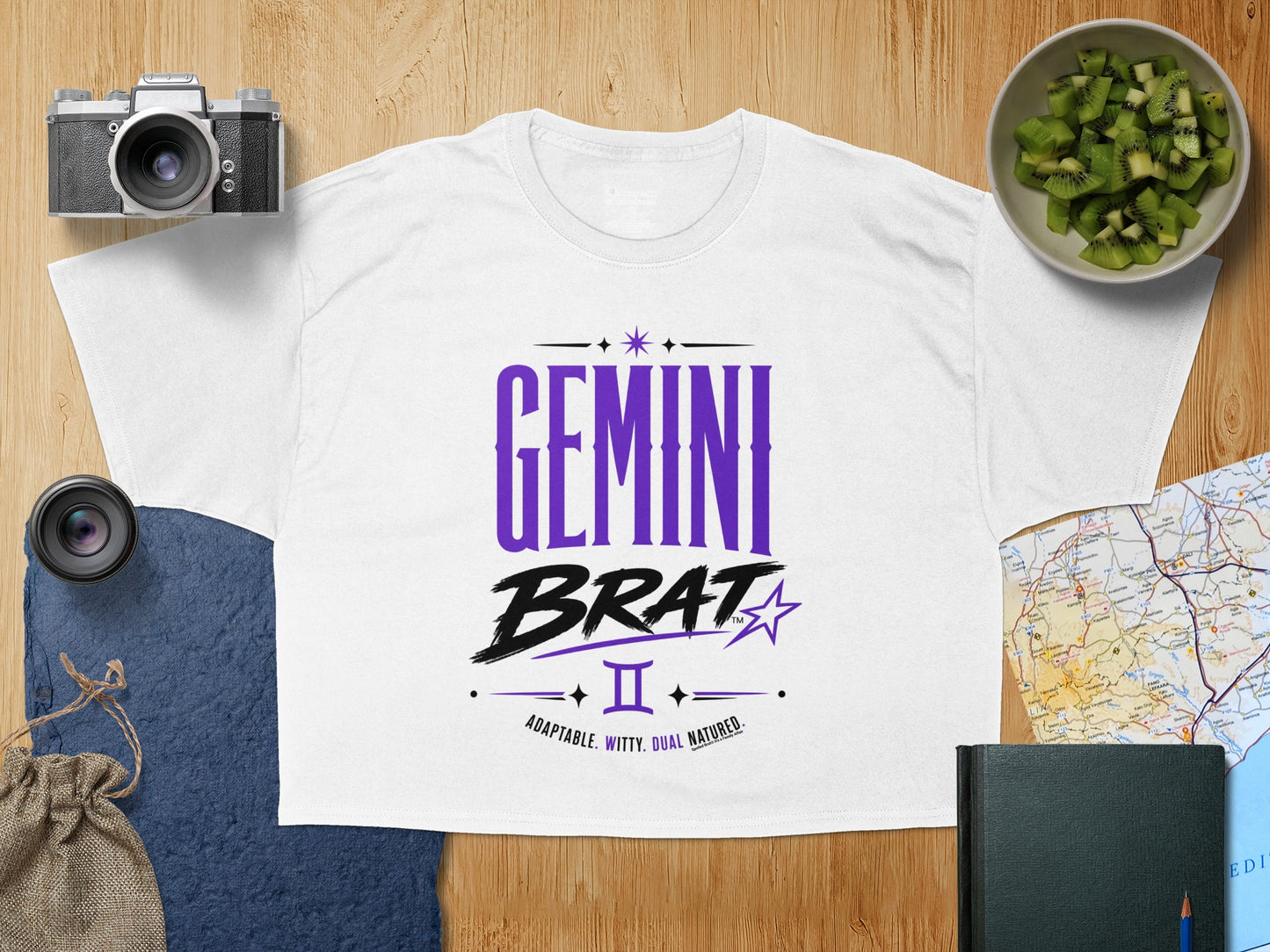White T-shirt with "Gemini Brat" and zodiac symbol, adaptable, witty, dual-natured.
