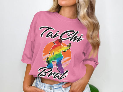 Pink t-shirt with rainbow Tai Chi figure and "Tai Chi Brat" text.