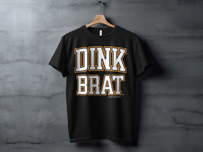 Black t-shirt with "DINK BRAT" text in white and orange.