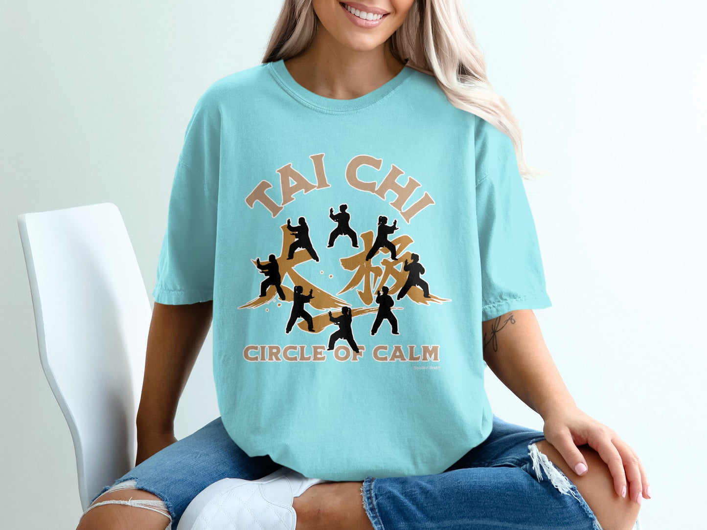T-shirt with "Tai Chi Circle of Calm" text and silhouettes of people practicing Tai Chi.