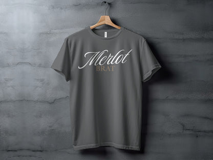 Grey t-shirt with "Merlot Brat" text in white and gold.