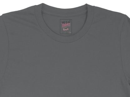 Gray t-shirt with a "Travel Brats" graphic and accompanying text.