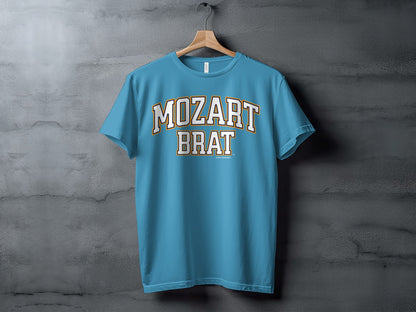 Blue t-shirt with white and yellow text that reads "MOZART BRAT"