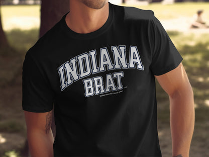 Black t-shirt with "INDIANA BRAT" in white arched lettering.