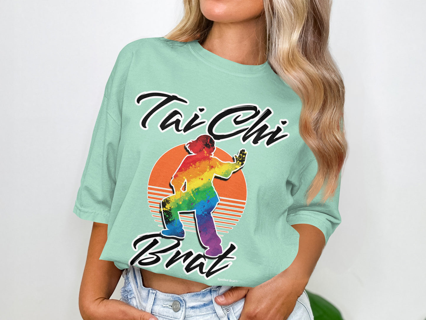 Mint green t-shirt with rainbow Tai Chi figure and "Tai Chi Brat" text.