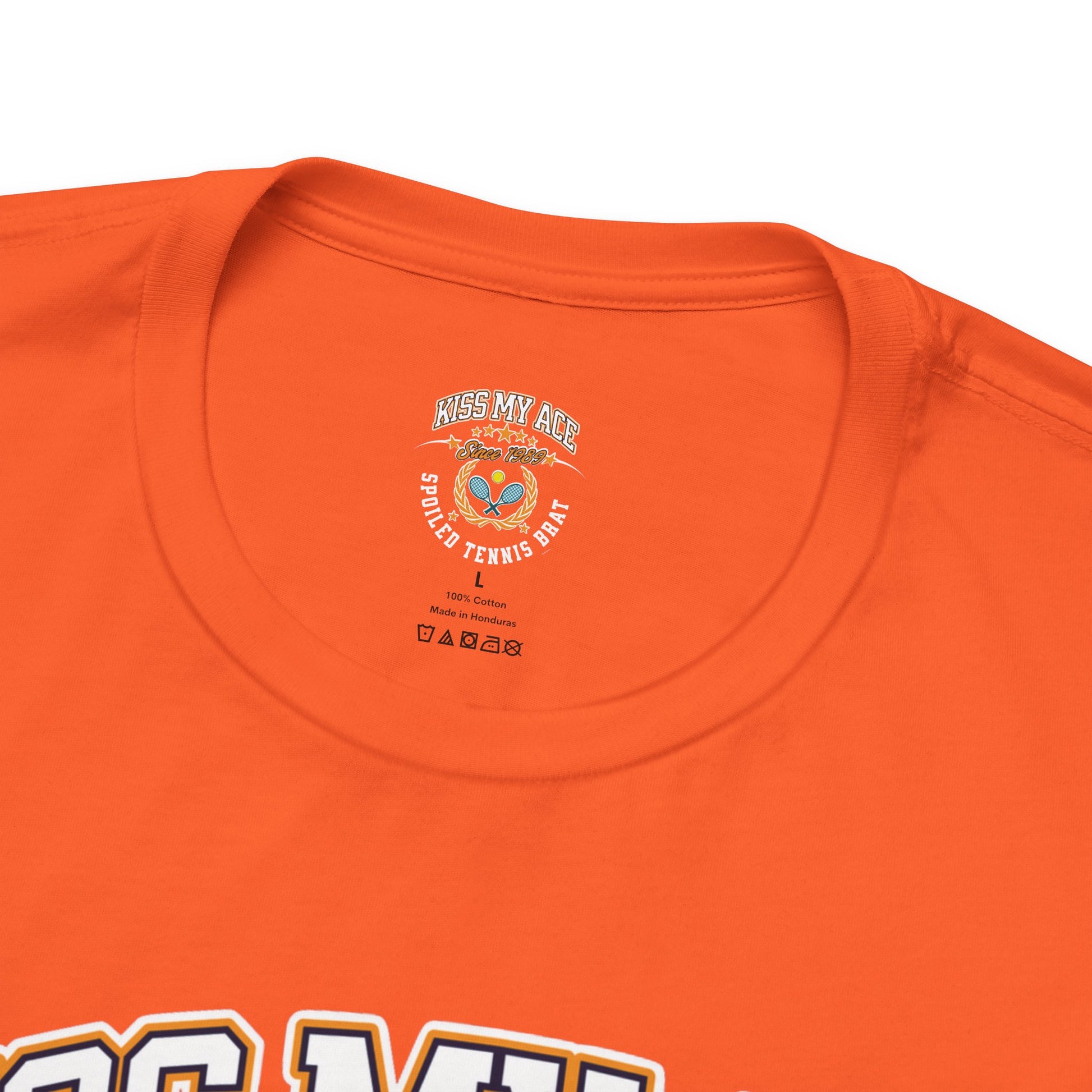 Orange t-shirt collar with "Kiss My Ace Spoiled Tennis" logo and size L.