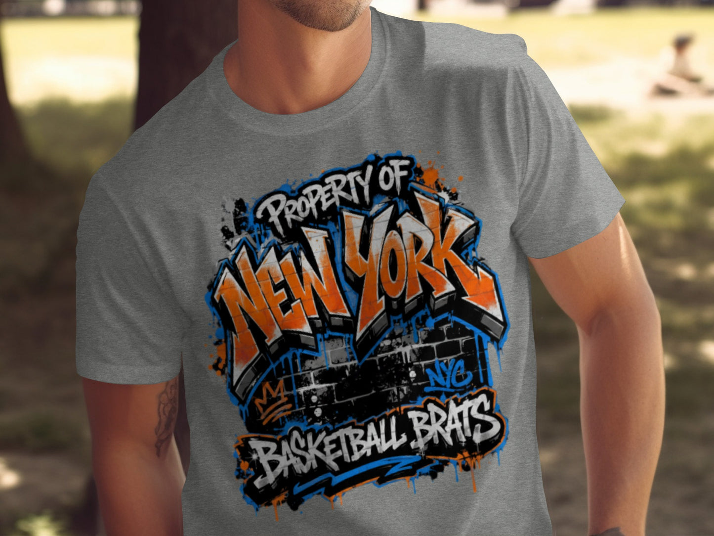Gray t-shirt with "Property of New York Basketball Brats" graffiti design.