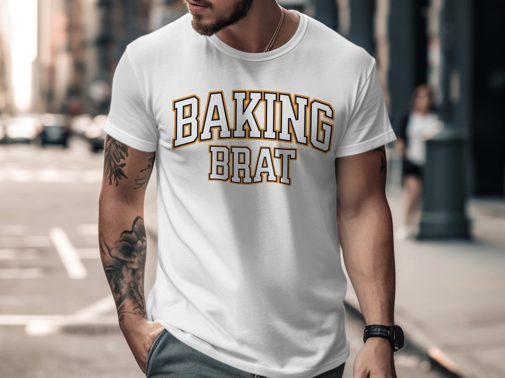 White t-shirt with "BAKING BRAT" text in collegiate style lettering.