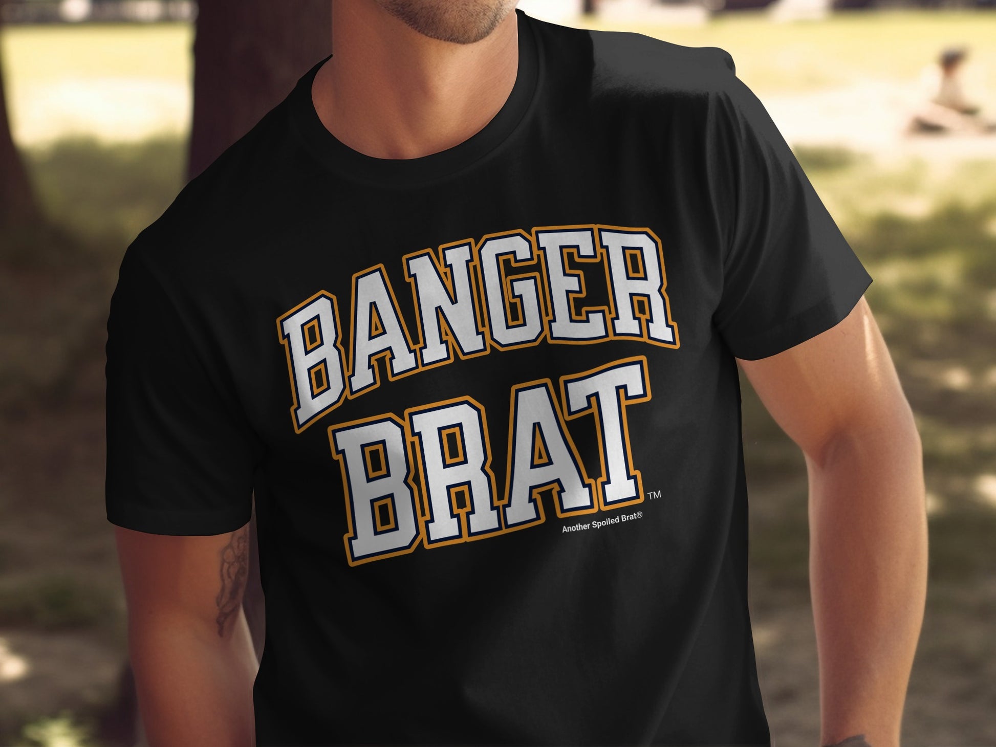 Black t-shirt with "BANGER BRAT" in white and orange collegiate font.