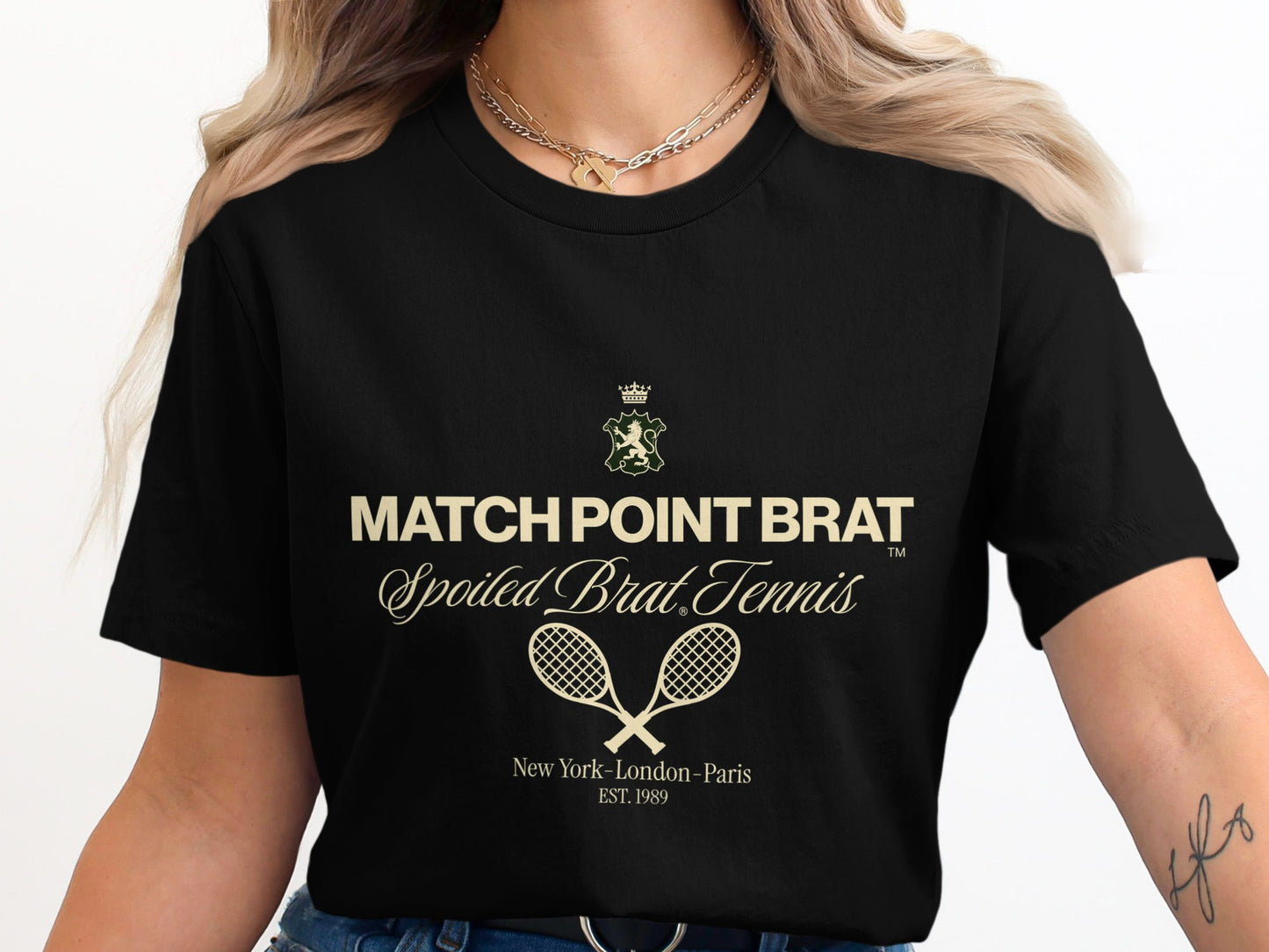 Black t-shirt with "MATCH POINT BRAT Spoiled Brat Tennis" and crossed racquets.
