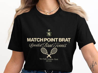Black t-shirt with "MATCH POINT BRAT Spoiled Brat Tennis" and crossed racquets.