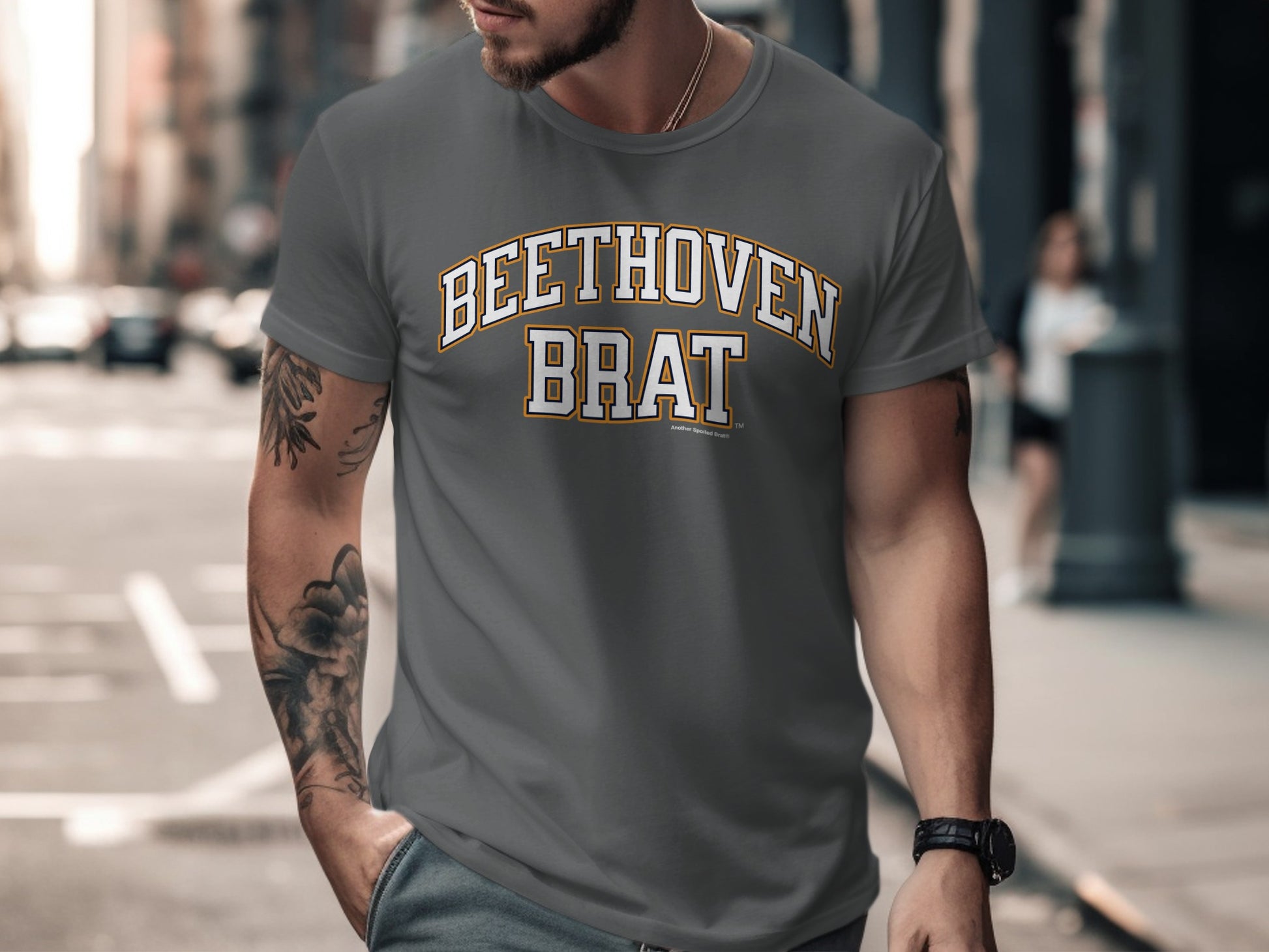 Grey t-shirt with "BEETHOVEN BRAT" text in varsity lettering.