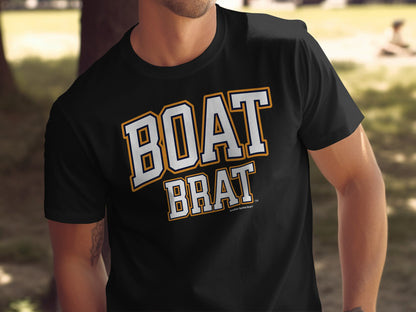 Black t-shirt with white and gold "BOAT BRAT" text and "Another Spoiled Brat" tagline.