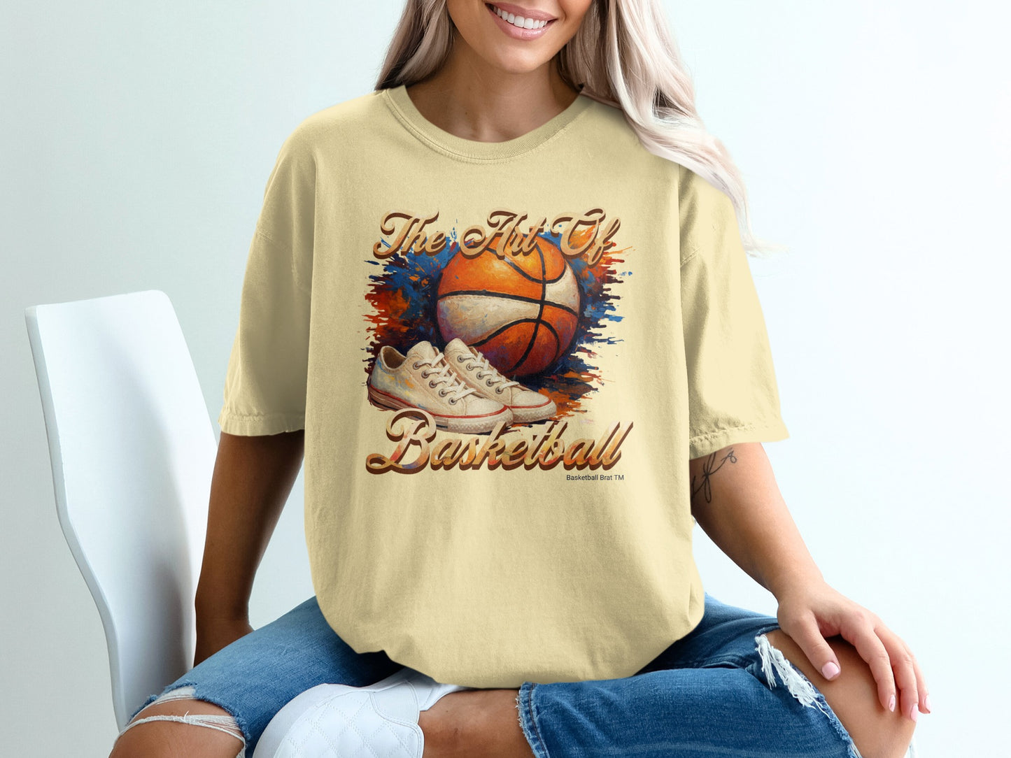 Cream t-shirt with "The Hot of Basketball" graphic featuring sneakers and basketball.