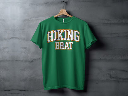 Green t-shirt with "HIKING BRAT" text and a smaller "Another Spoiled Brat®" text.
