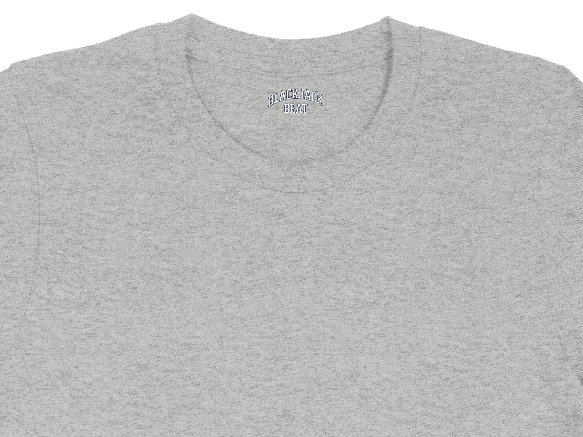Grey t-shirt with "BLACKJACK BRAT" embroidered in blue letters on the collar.