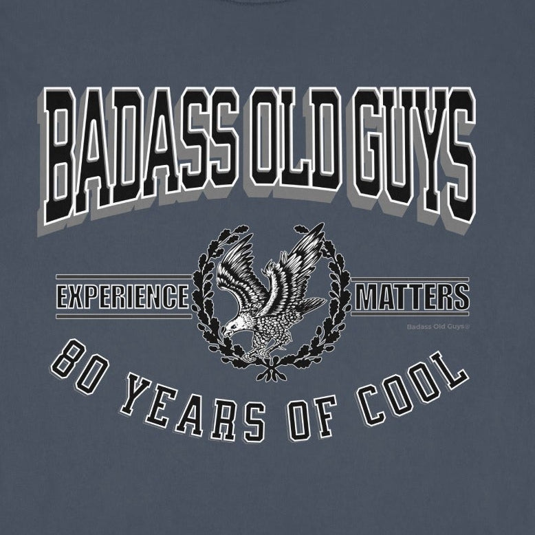T-shirt with text "Badass Old Guys Experience 80 Years of Cool" and an eagle graphic.