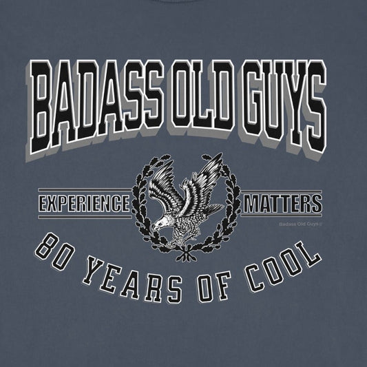 T-shirt with text "Badass Old Guys Experience 80 Years of Cool" and an eagle graphic.
