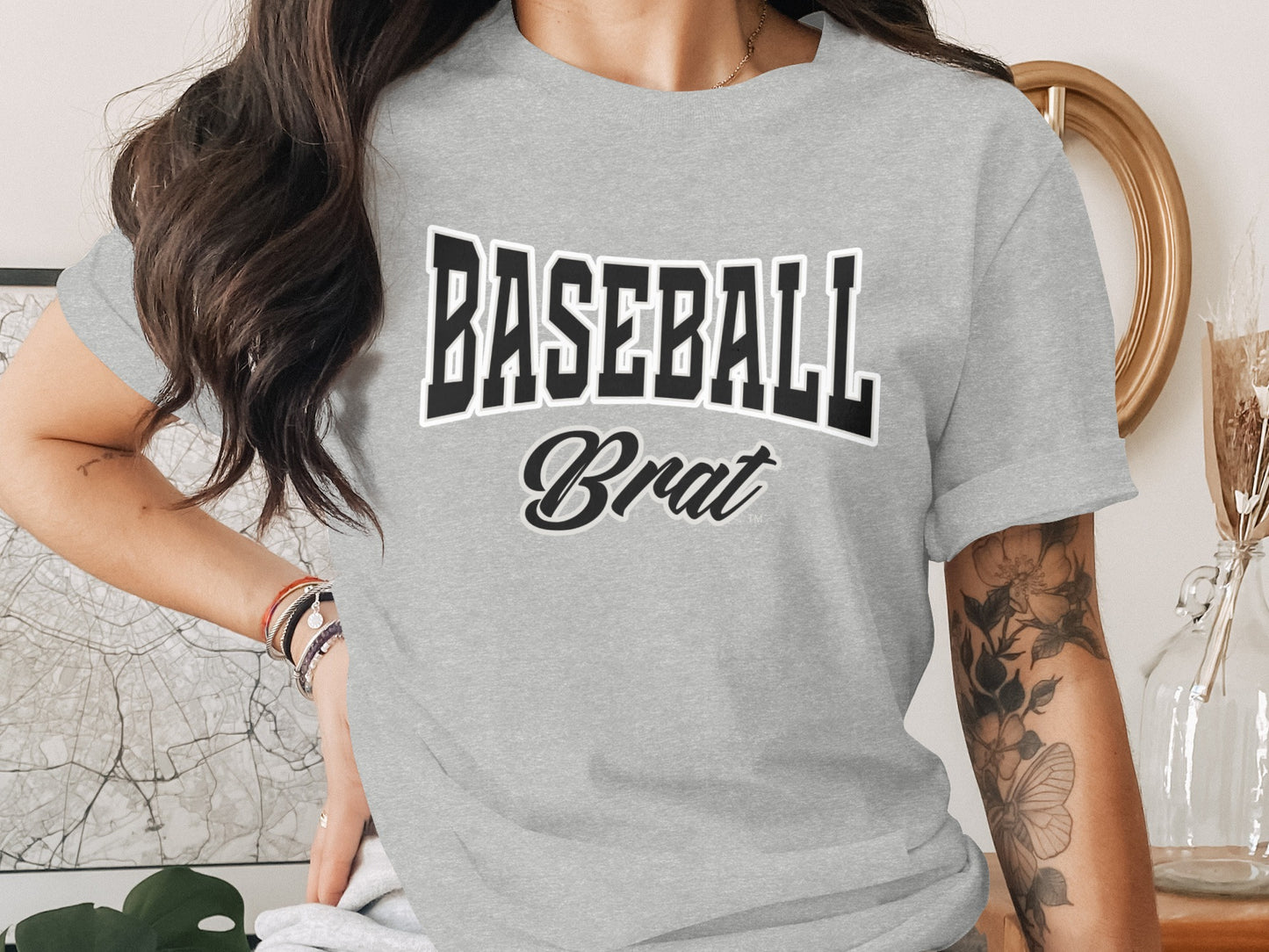 Grey t-shirt with "BASEBALL Brat" text.