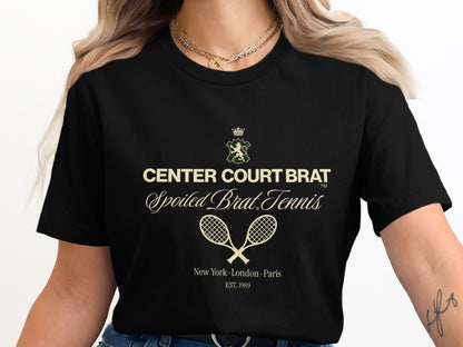 Black t-shirt with "CENTER COURT BRAT Spoiled Brat Tennis" and crossed racquets.