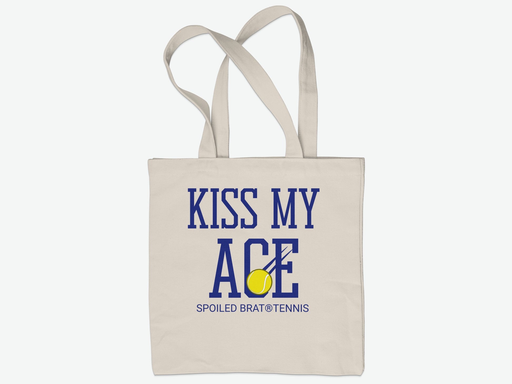 Beige canvas tote bag with "Kiss My Ace" text and tennis ball graphic.