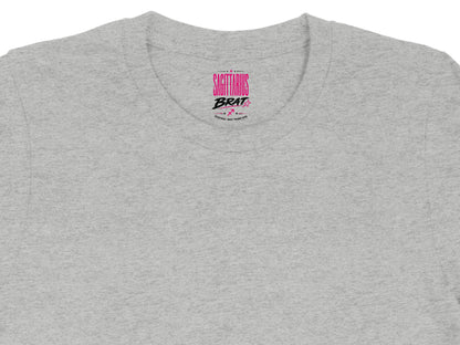 Grey crewneck t-shirt with "Sagittarius Brat" pink text and zodiac symbols.