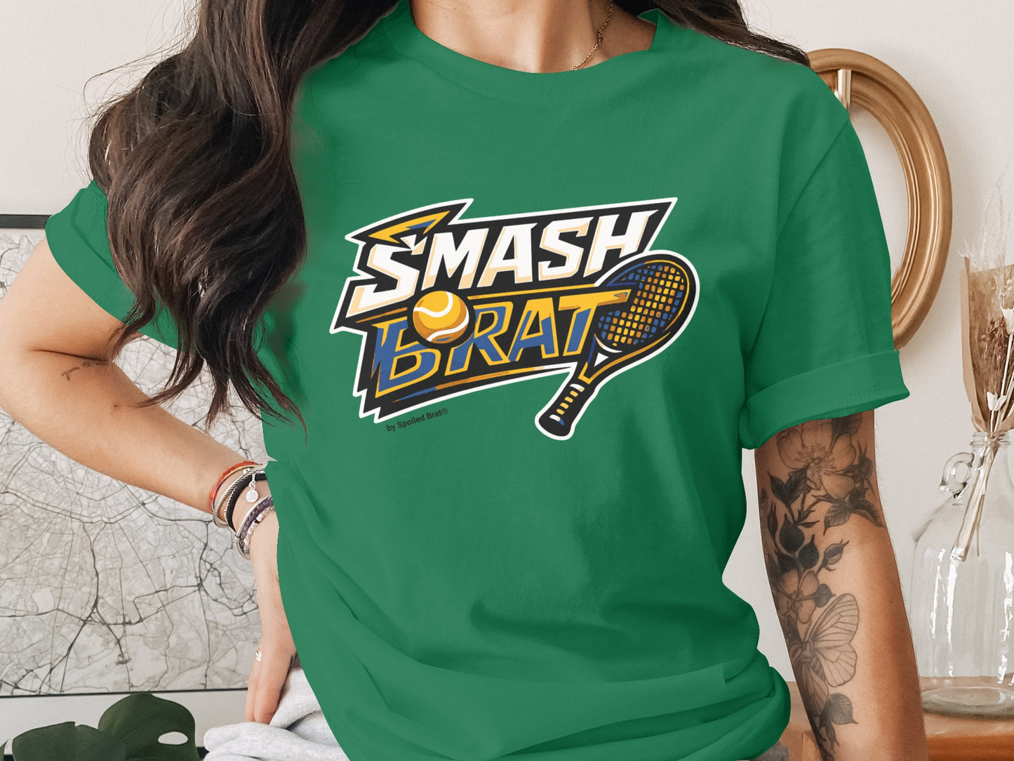 Green t-shirt with "SMASH BRAT" logo, tennis ball, and racket.