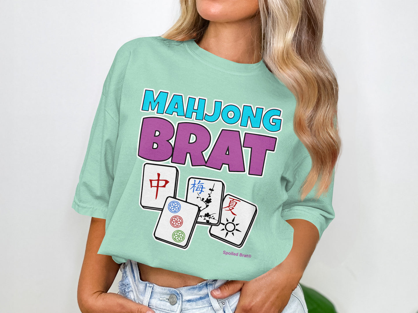 T-shirt with "Mahjong Brat" text and four Mahjong tiles.