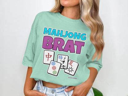 T-shirt with "Mahjong Brat" text and four Mahjong tiles.