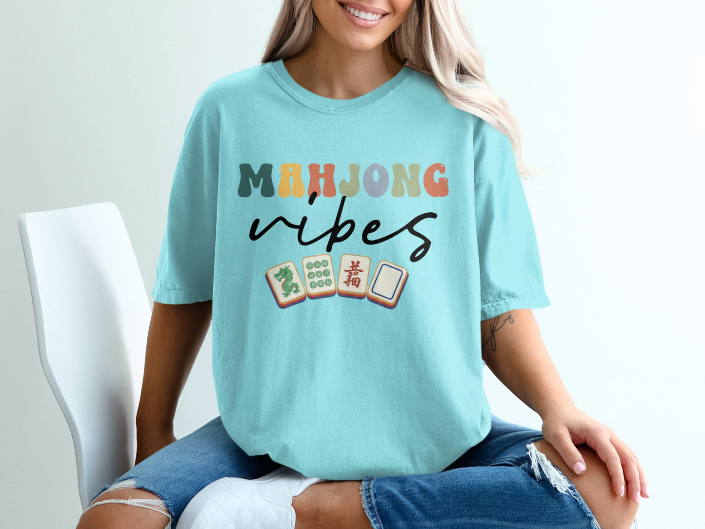 T-shirt with "Mahjong vibes" text and Mahjong tiles.