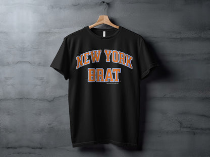 Black t-shirt with "NEW YORK BRAT" in orange and blue lettering.