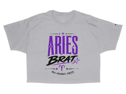 Grey cropped t-shirt with "Aries Brat" text, Aries symbol, and "Bold, Passionate. Fearless."