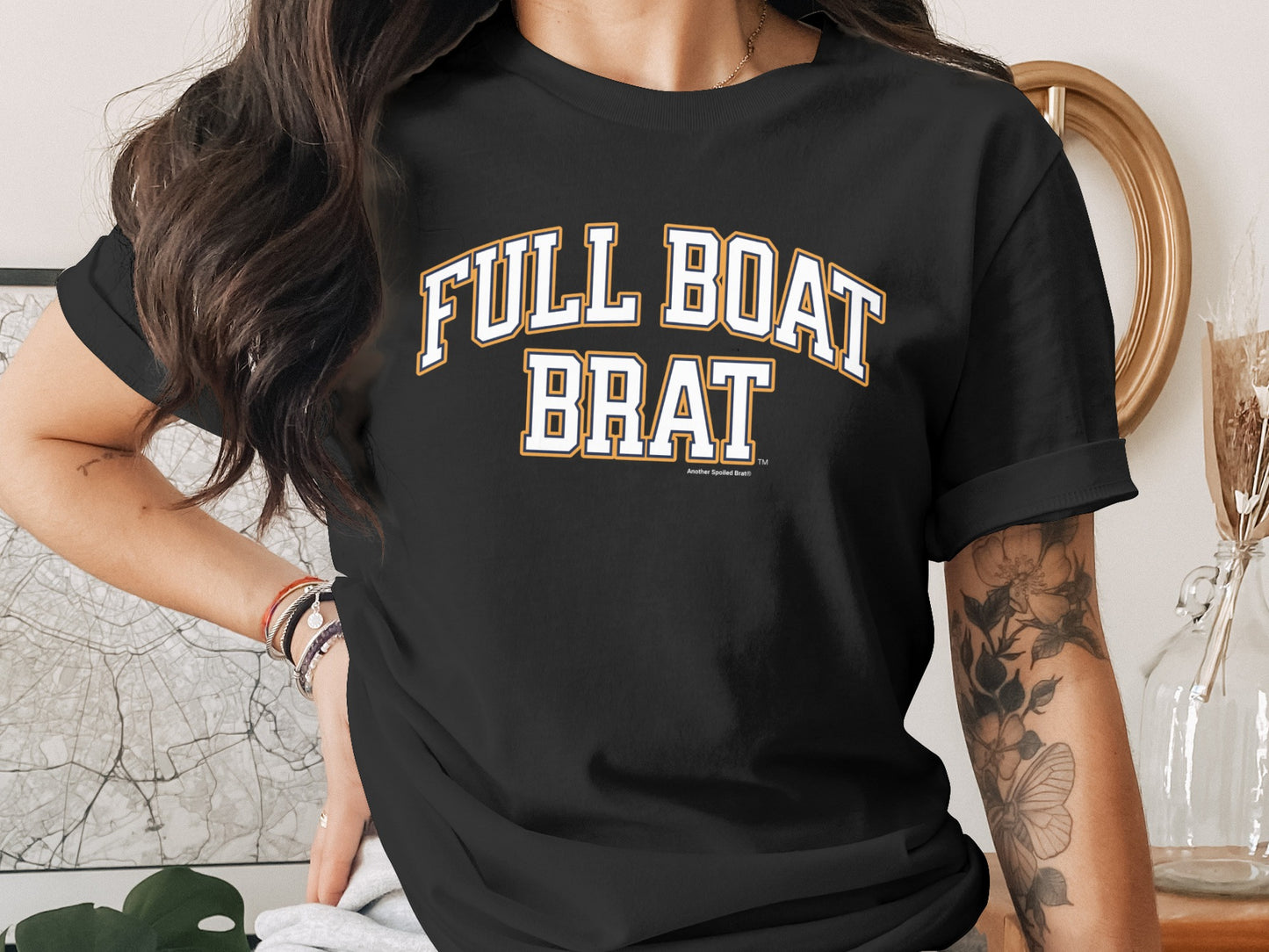 Black t-shirt with white and gold text reading "FULL BOAT BRAT".
