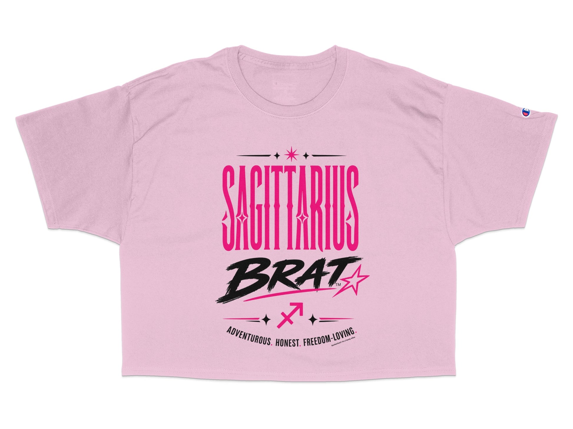 Pink cropped t-shirt with "Sagittarius Brat" text and zodiac symbol.