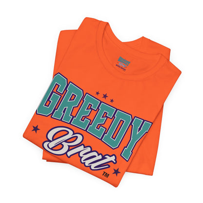 Orange t-shirt graphic with "GREEDY Brat" text across the chest.