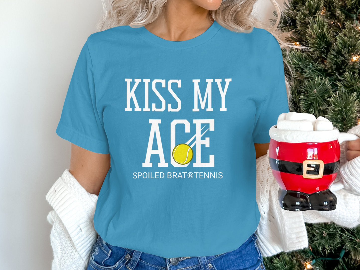 Blue t-shirt with "Kiss My Ace" and tennis ball graphic.