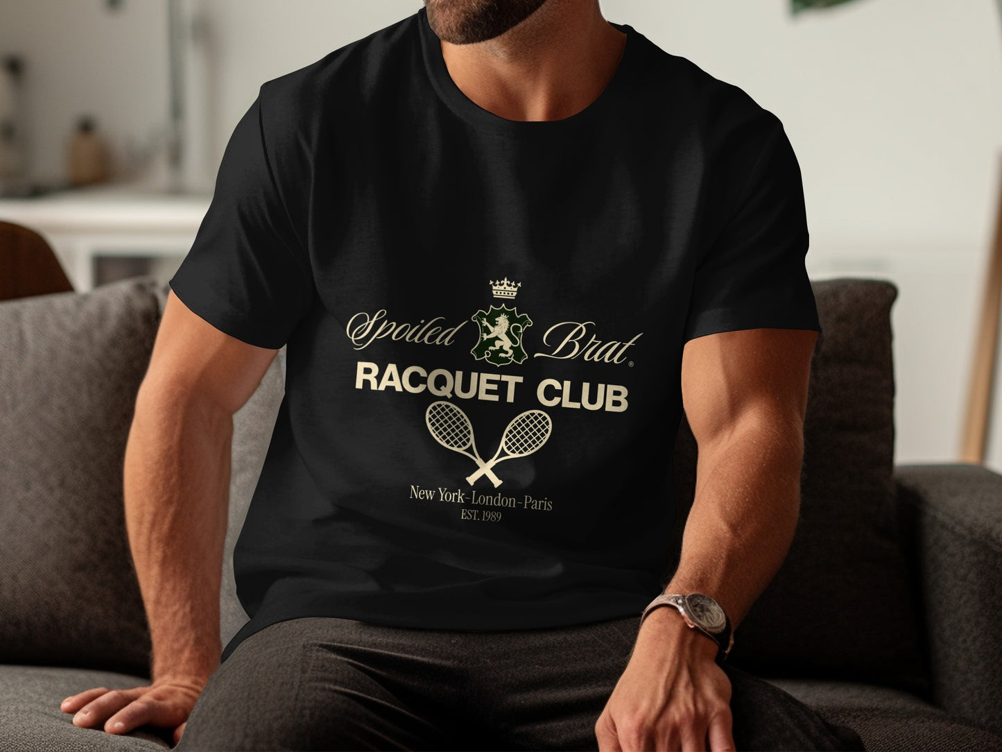 Black t-shirt with "Spoiled Brat Racquet Club" and crossed racquets graphic.
